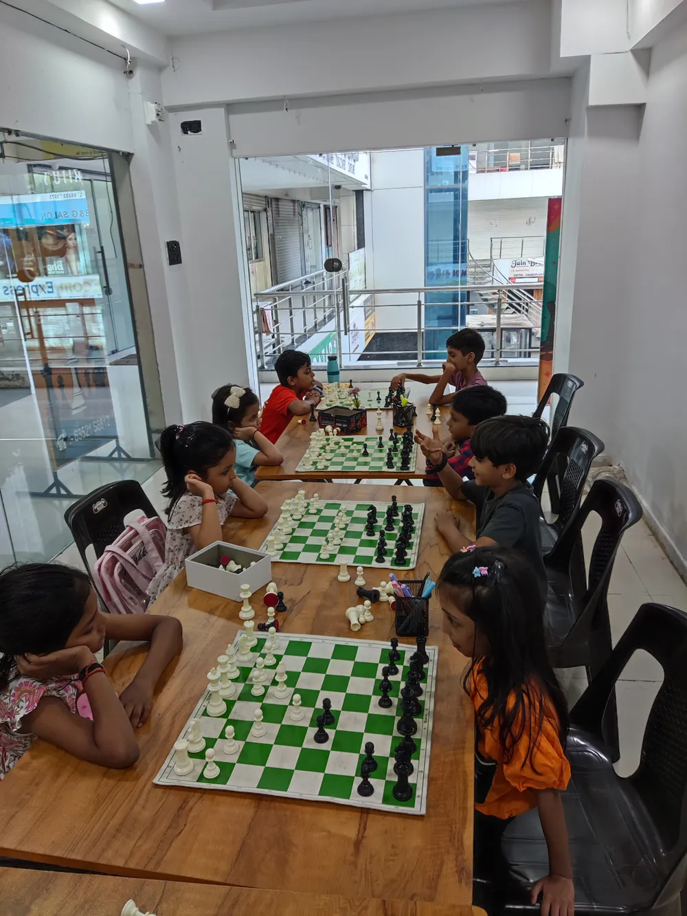 Children learning chess at Surat Chess Club in Vesu, Surat